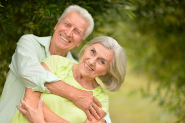 Happy senior couple in park