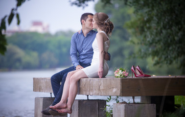 young man and woman on a walk in a park, happiness