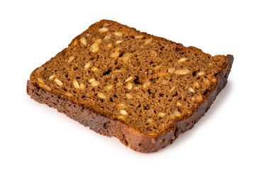 A piece of bread with seeds on a white background isolation