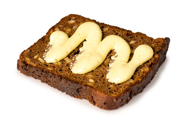 Piece of bread with sauce mayonnaise on white background isolation