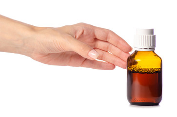 Bottle of syrup in hand medicine on white background isolation