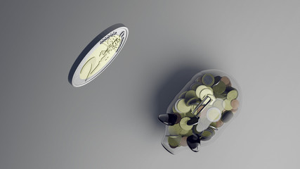 Sparschwein aus glas in das eine Münze fällt