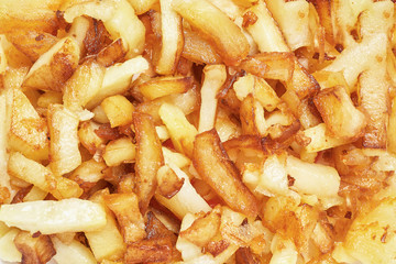 Fried potatoes close-up. Food background.