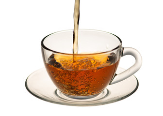 a jet of tea flows into the tea Cup, in isolation