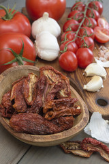 tomatoes on a wooden table. 