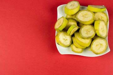 Cut banana. Fresh summer food concept. Vegetarian healthy diet