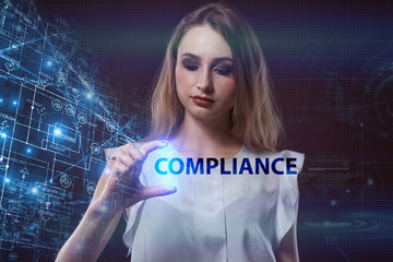 The concept of business, technology, the Internet and the network. A young entrepreneur working on a virtual screen of the future and sees the inscription: Compliance