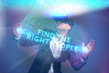 Business, Technology, Internet and network concept. Young businessman working in virtual reality glasses sees the inscription: Find the right people