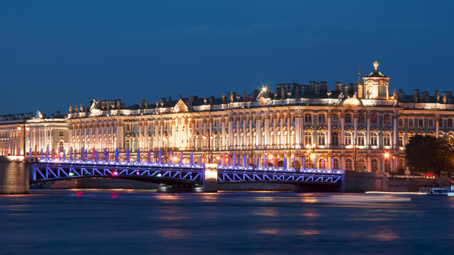 Hermitage museum (Winter Palace) and Palace Bridge at night, St. Petersburg, Russia