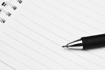 close up of pen on a white paper - for business concept