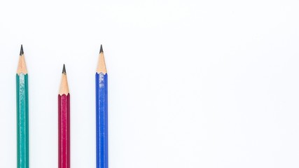 green, red and blue pencil isolated on white background