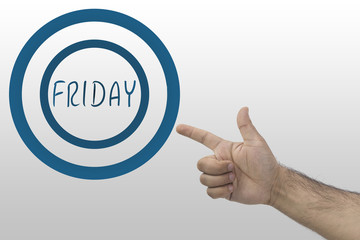 Hand pointing the inscription: Friday