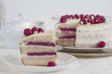 Homemade cake with berry curd, almonds and cream cheese.