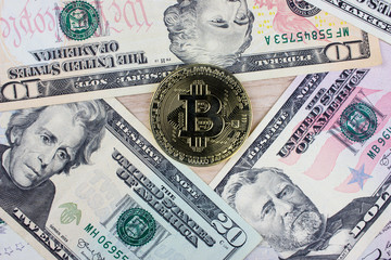 Obraz na płótnie Canvas Cryptocurrency Bitcoin and USA dollars. Blockchain technology