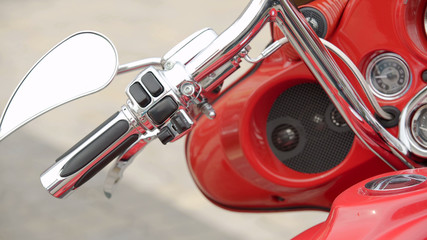 Demonstration of modern red motorcycle in outdoor motorbike exhibition, display