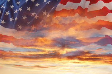 Fototapeta premium U.S.A. American flag stars and stripes in sunny sky