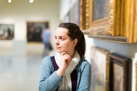 Portrait of woman who is visiting art gallery