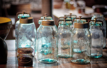 Vintage glass jars with blurred background