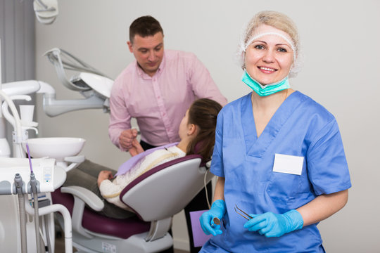 Female dentist in dental clinic