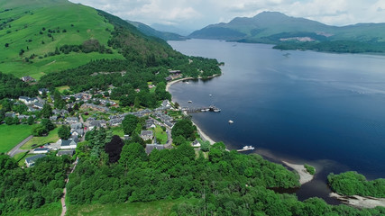 Aerial image over the picturesque village of Luss on the banks of Loch Lomond.