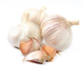 Cloves of garlic and bulbs isolated on a white background