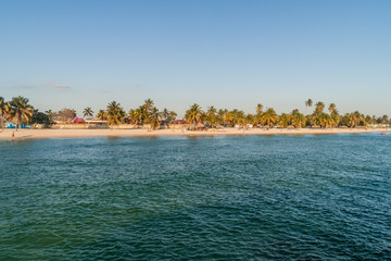 PLAYA GIRON, CUBA - FEB 14, 2016: People on a beach in Playa Giron village, Cuba.