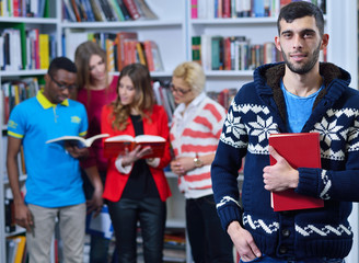 Group of students learning in library at university
