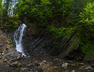 Fototapeta premium Waterfall Zhenetskyi Huk, panorama, Carpathians of Ukraine.