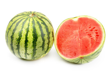 Ripe round watermelon and half berry isolated on white background.