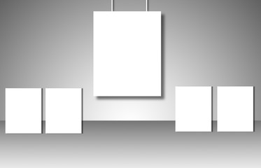 Empty white posters on gray background
