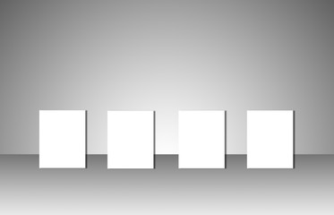 Empty white posters on gray background