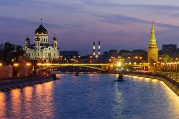 Sunset view of Cathedral of Christ the Savior, Moscow Kremlin and Moscow river. Architecture and landmarks of Moscow, Russia.