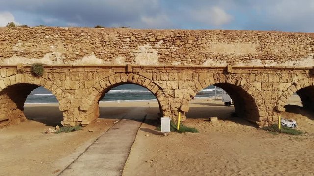 Aqueduct on the beach in Caesarea