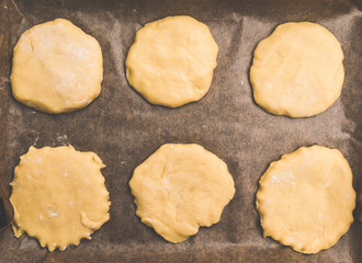 Home handmade baking, the dough on parchment paper for baking
