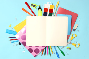 Fototapeta premium set of stationery on a colored background with space for text. back to school. office tools. flat lay, top view