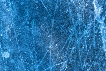 Textured ice blue frozen rink winter background