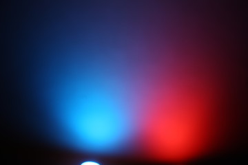 Red and blue glow lanterns on a dark background