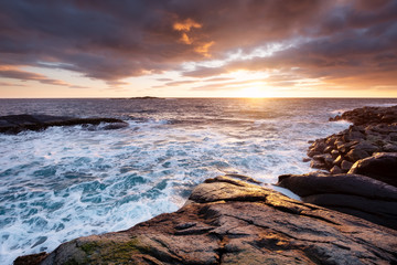 Obraz premium Seascape during storm and sunrise. Natural seascape in the Norway