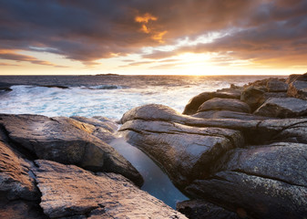 Seascape during storm and sunrise. Natural seascape in the Norway