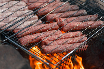 Sausage fire-roasted on the grill