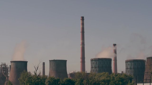 Chimneys of power plant. Air pollution of industrial manufactiring concept