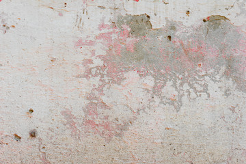 Wall fragment with scratches and cracks