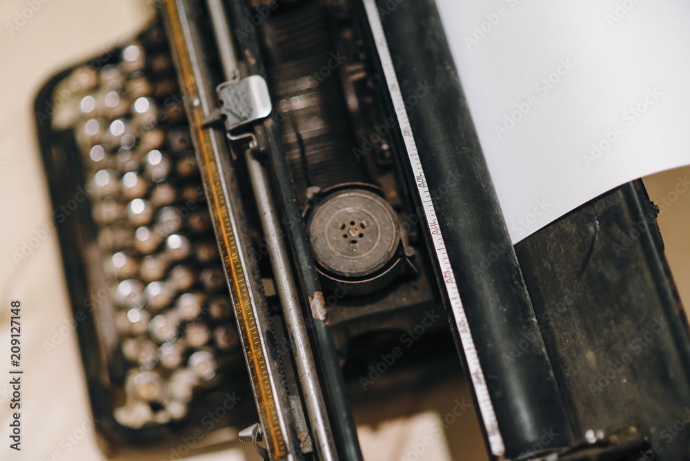 Fototapete typewriter with paper sheet. space for your text