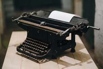typewriter with paper sheet. Space for your text