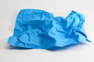 crumpled light blue paper