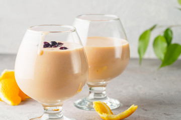 Two cocktail glass with smoothies milkshake healthy drink