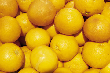 Colorful Display Of Lemons In Market