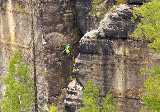 Climber on the rope, Saxony Switzerland, Germany
