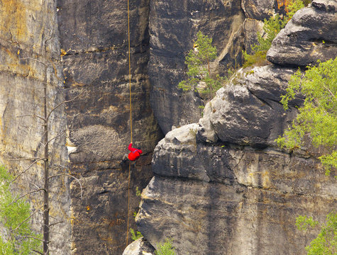 Climber on the rope, Saxony Switzerland, Germany