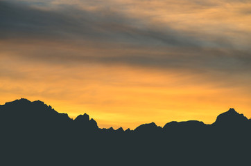 sunrise over a mountain range
